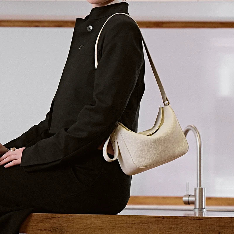 Ivory Pebbled Leather Mini Crescent Shoulder Bag with Wrist Strap